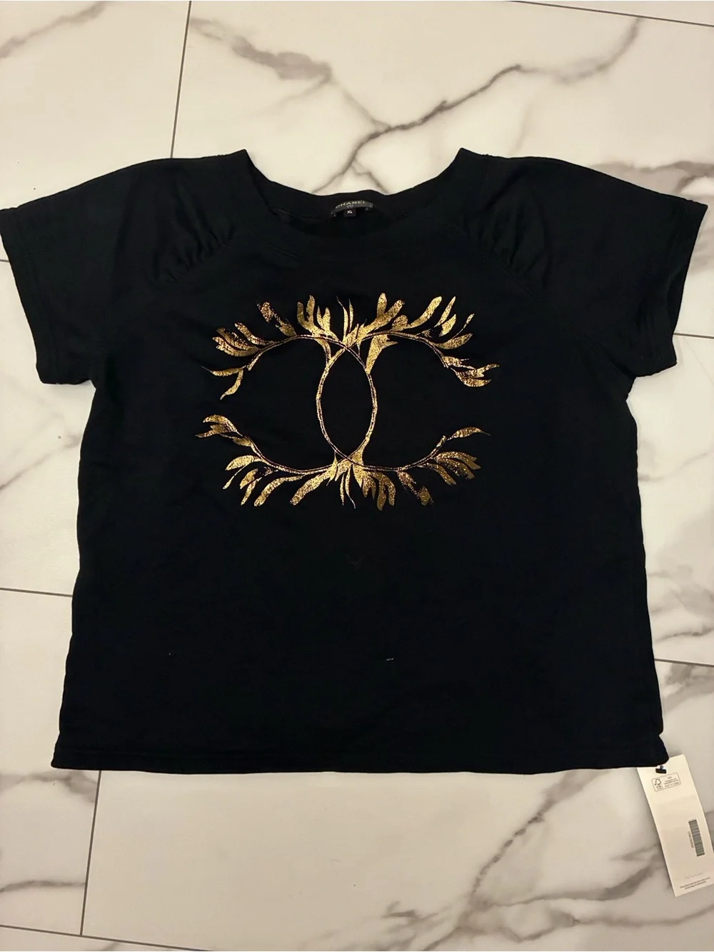CHANEL Black Tee with Gold Logo Accent